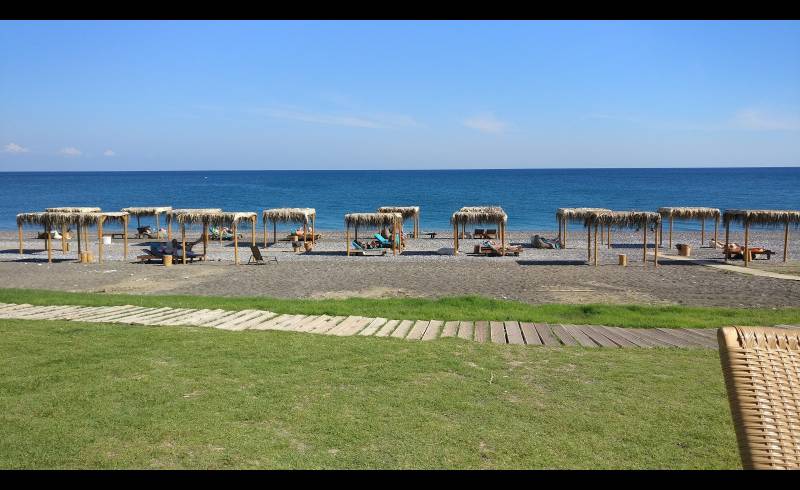 Megali Gi beach.'in fotoğrafı hafif çakıl yüzey ile