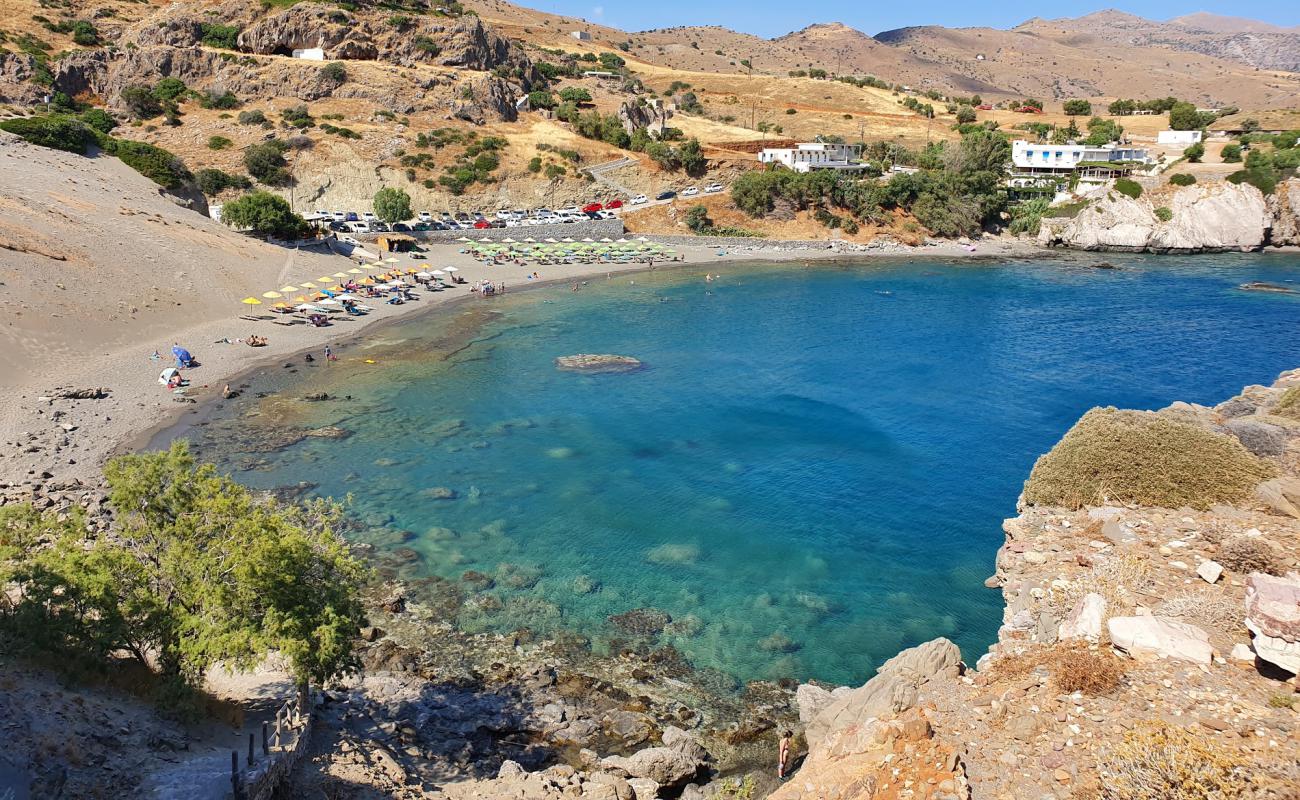 Agios Pavlos beach'in fotoğrafı gri çakıl taşı yüzey ile