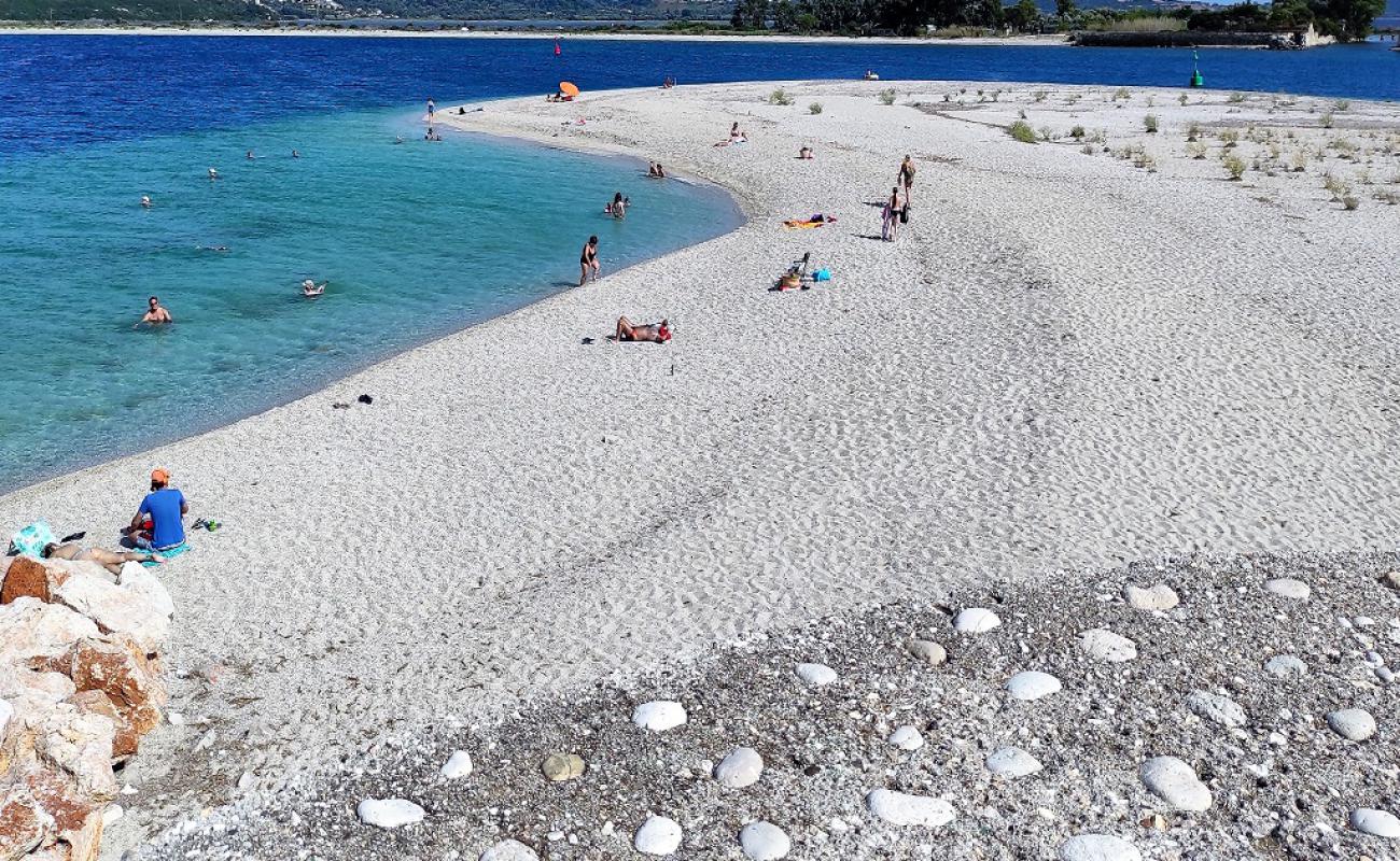 Ammoglossa Beach'in fotoğrafı bej kum ve kayalar yüzey ile