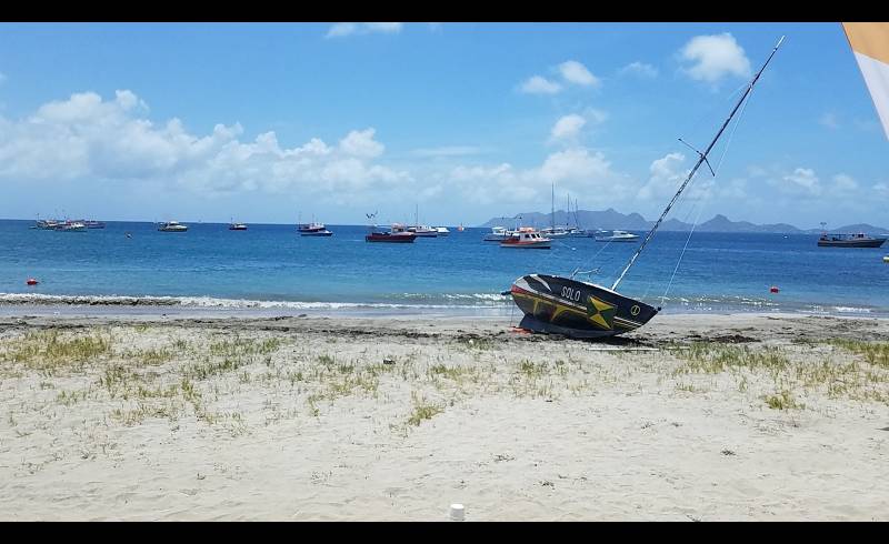 Petite Martinique beach'in fotoğrafı açık bej kum yüzey ile