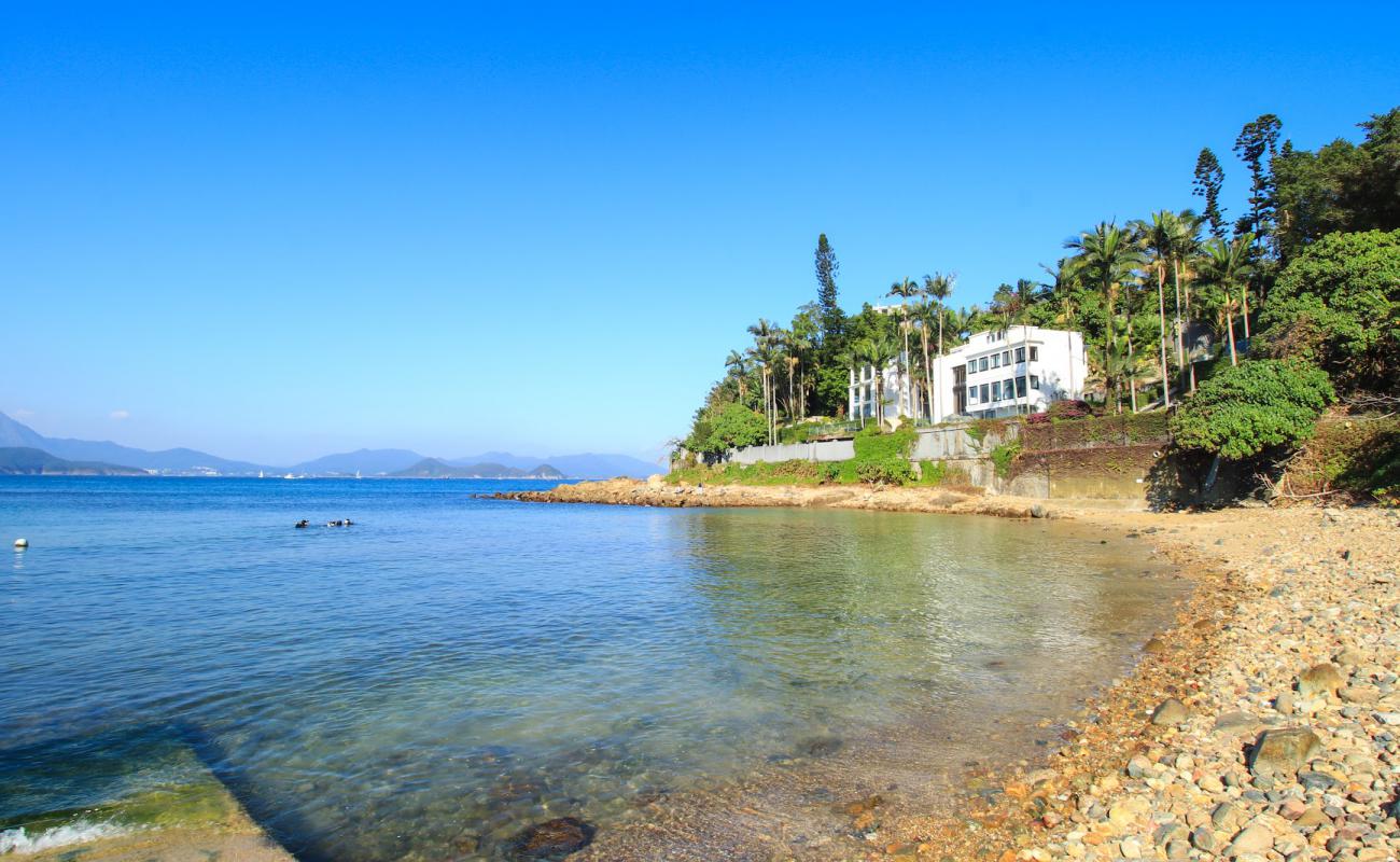Little Palm Beach'in fotoğrafı bej kum ve kayalar yüzey ile