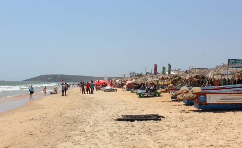 Calangute Beach'in fotoğrafı açık bej kum yüzey ile