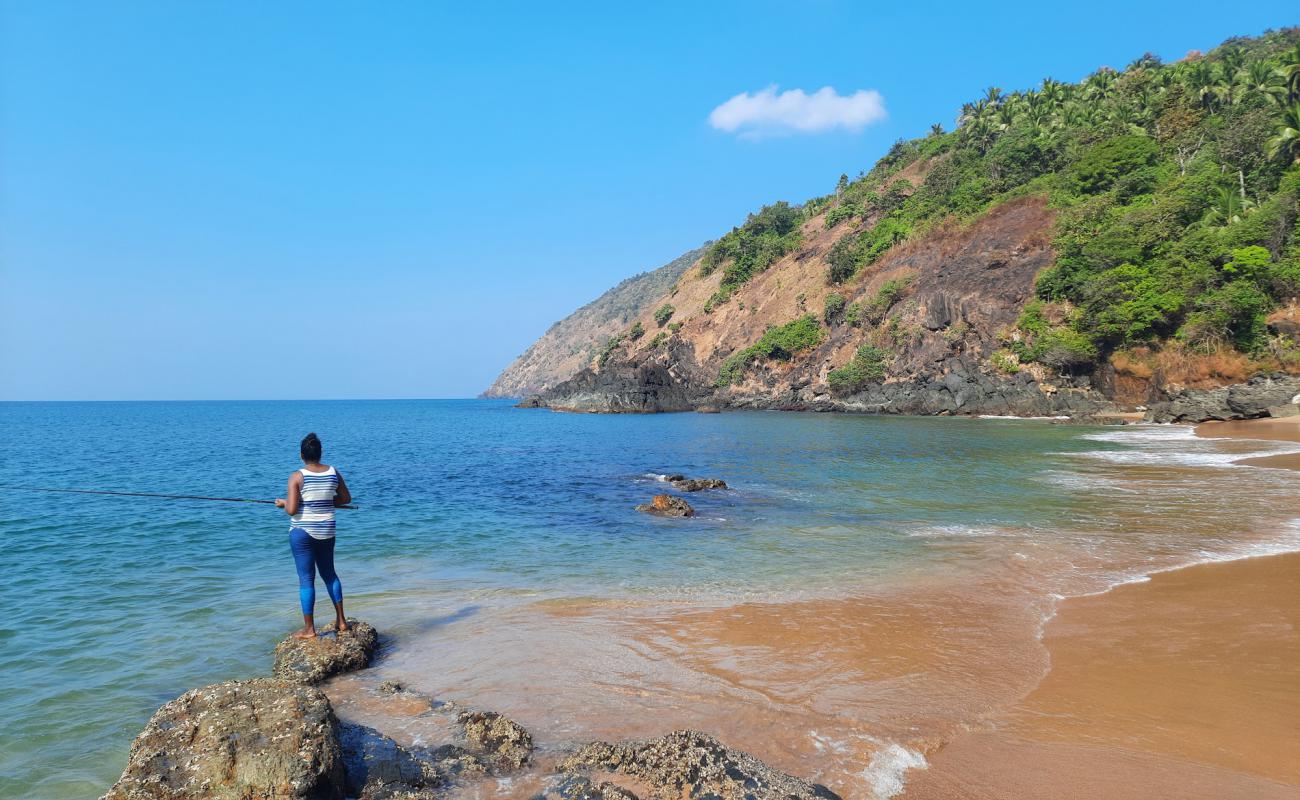 Kakolem Beach'in fotoğrafı açık bej kum yüzey ile