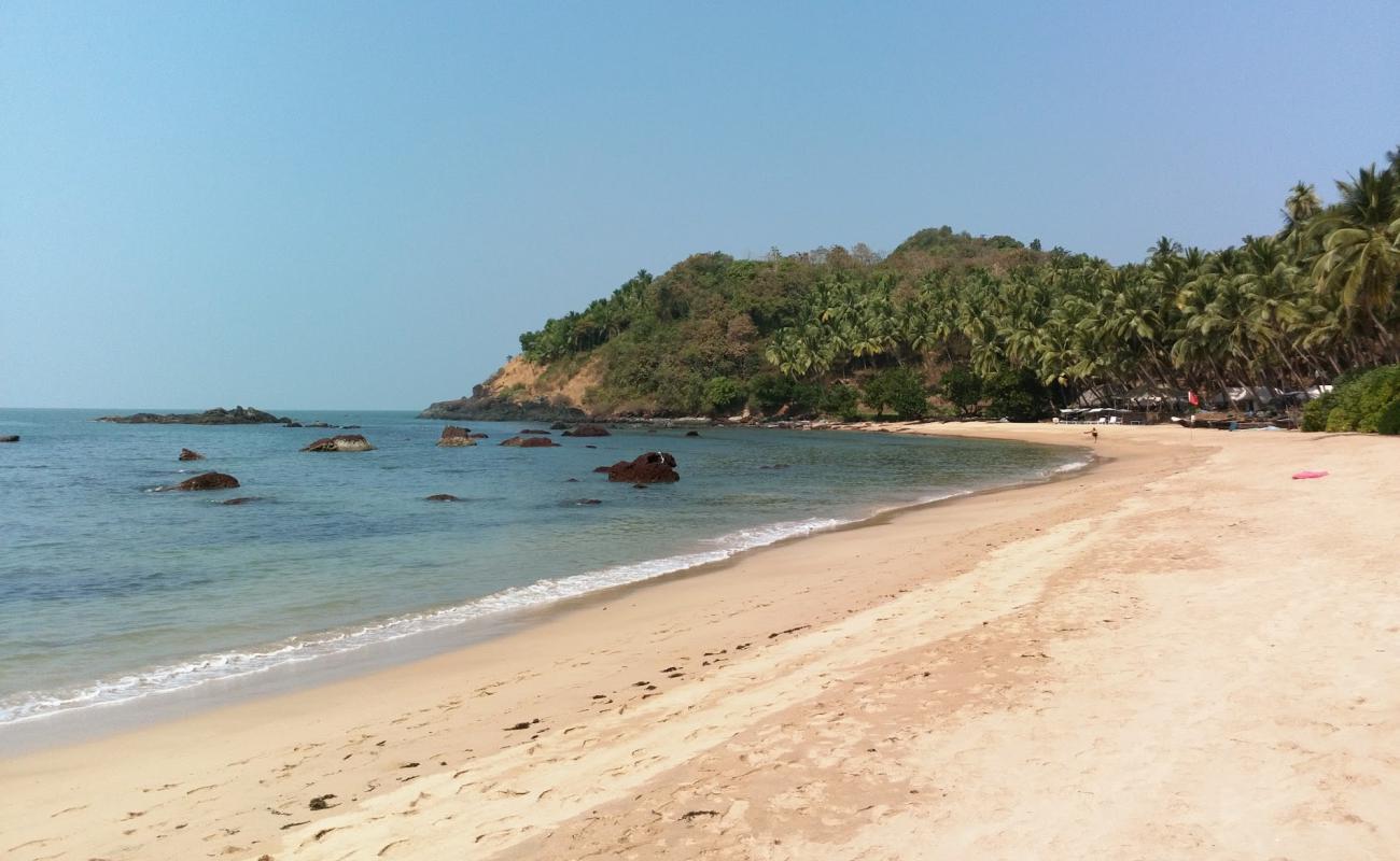 Small Cola Beach'in fotoğrafı açık bej kum yüzey ile