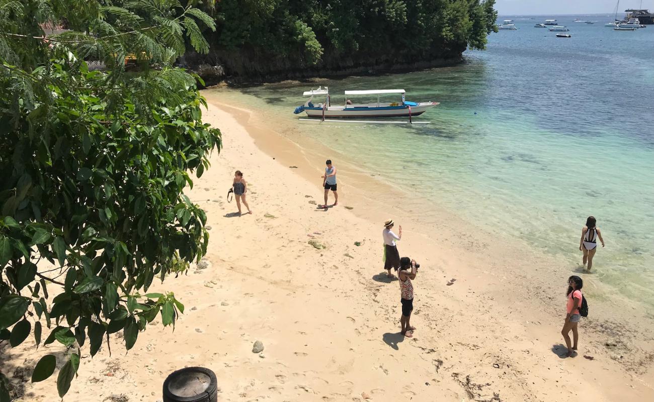 Song Lambung Beach'in fotoğrafı açık bej kum yüzey ile