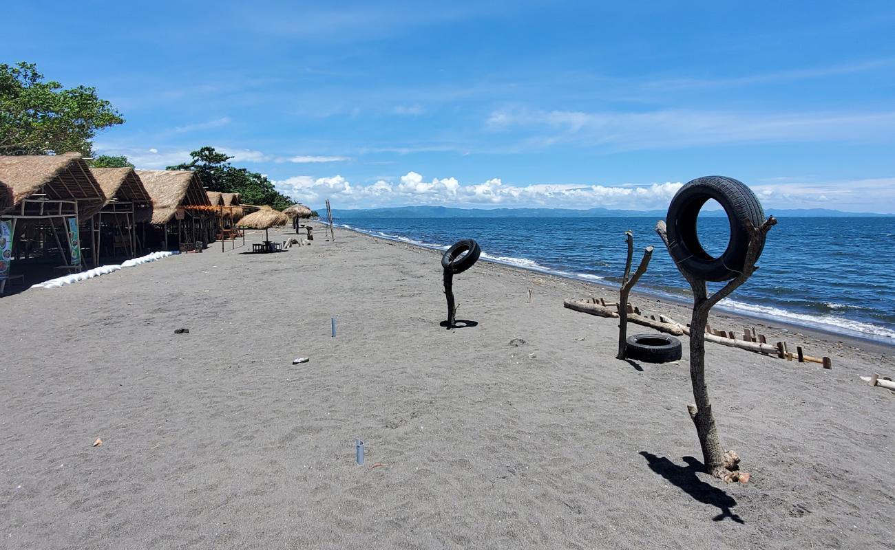 Batas Senja Beach'in fotoğrafı kahverengi kum yüzey ile
