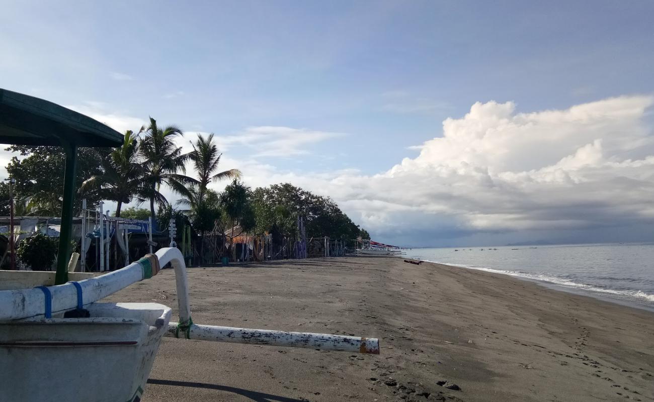 Kedai Pesona Tanjung Bias'in fotoğrafı kahverengi kum yüzey ile