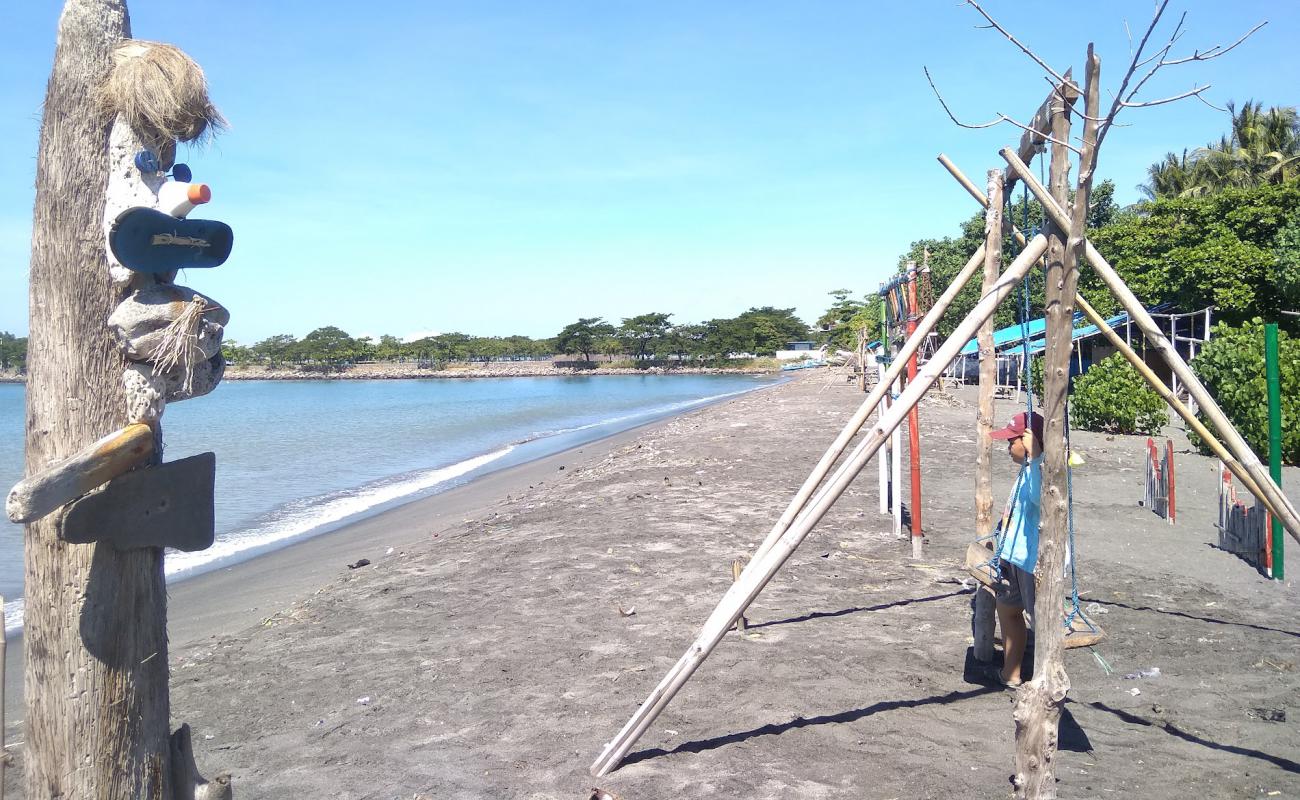 Labuhan Haji beach'in fotoğrafı açık bej kum yüzey ile