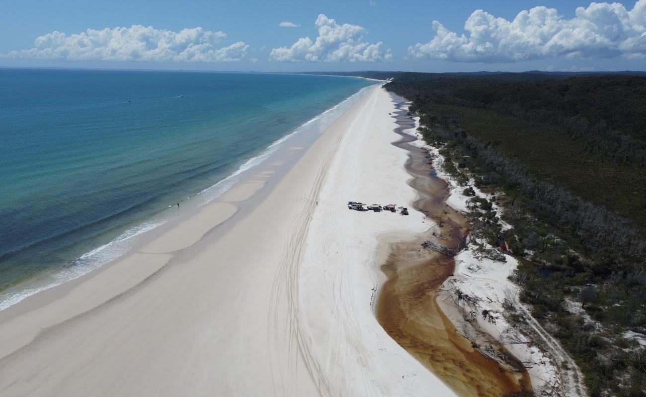 Woralie Creek Beach'in fotoğrafı i̇nce bej kum yüzey ile