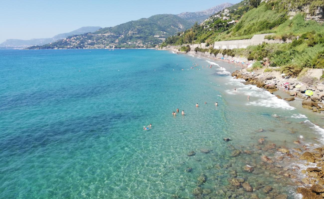 Le Calandre beach'in fotoğrafı kahverengi kum yüzey ile