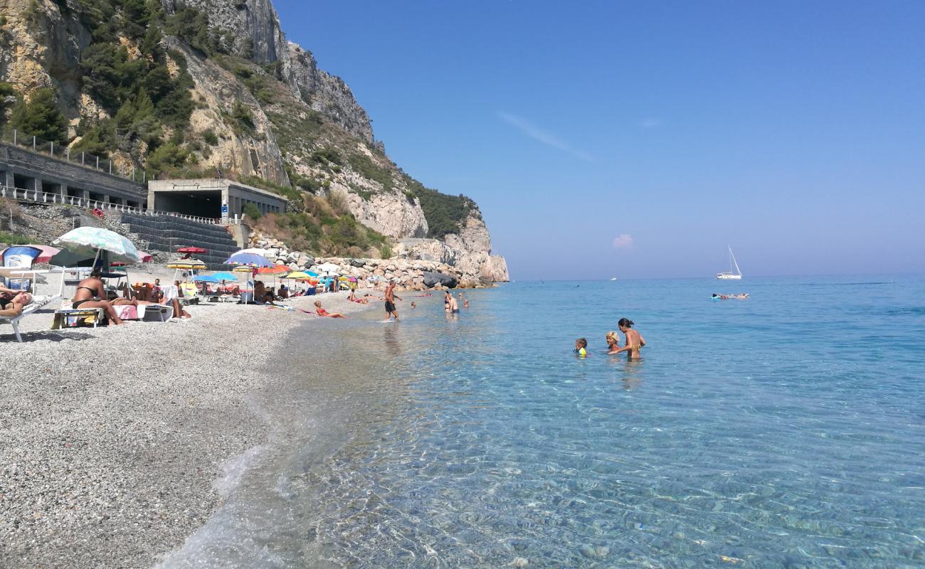 Spiaggia del Malpasso'in fotoğrafı koyu i̇nce çakıl yüzey ile