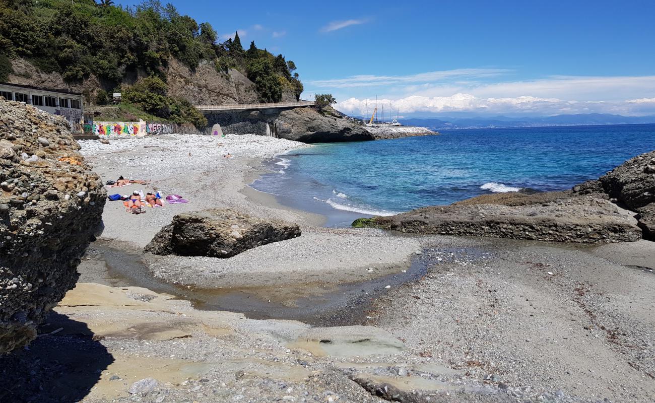 Punta dell' Aspera'in fotoğrafı taşlar yüzey ile