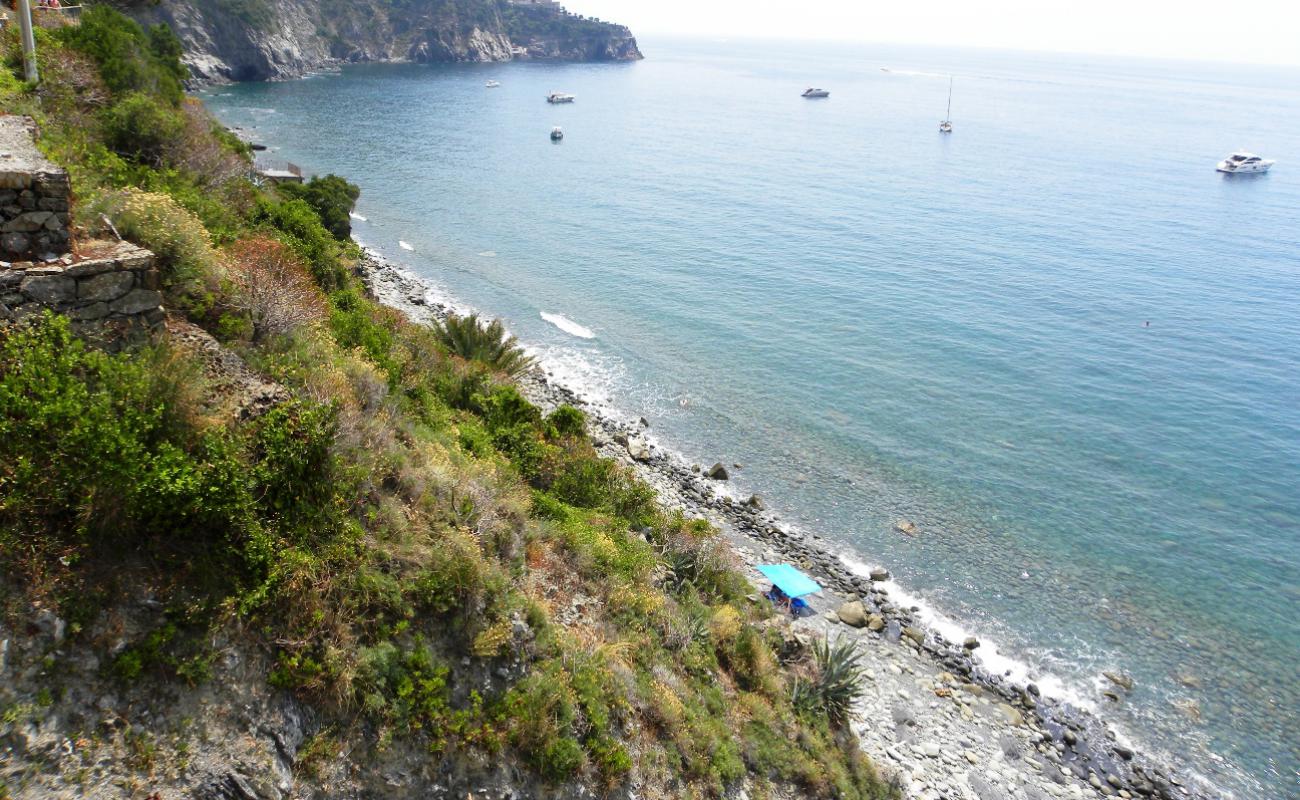 Spiaggia di Guvano Vernazza'in fotoğrafı taşlar yüzey ile