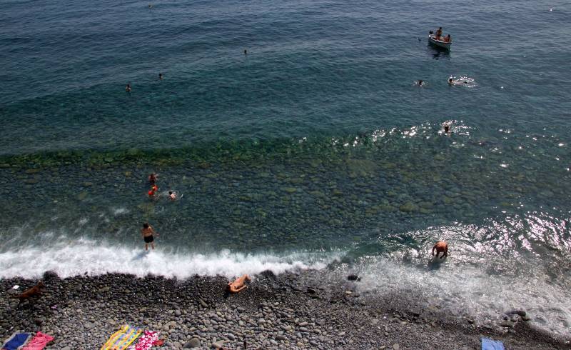 Spiaggione di Corniglia'in fotoğrafı taşlar yüzey ile