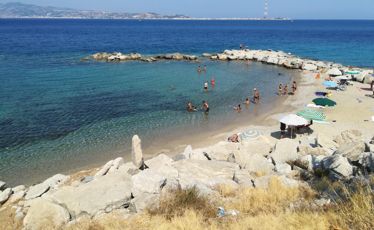 Porticello beach'in fotoğrafı kahverengi kum yüzey ile