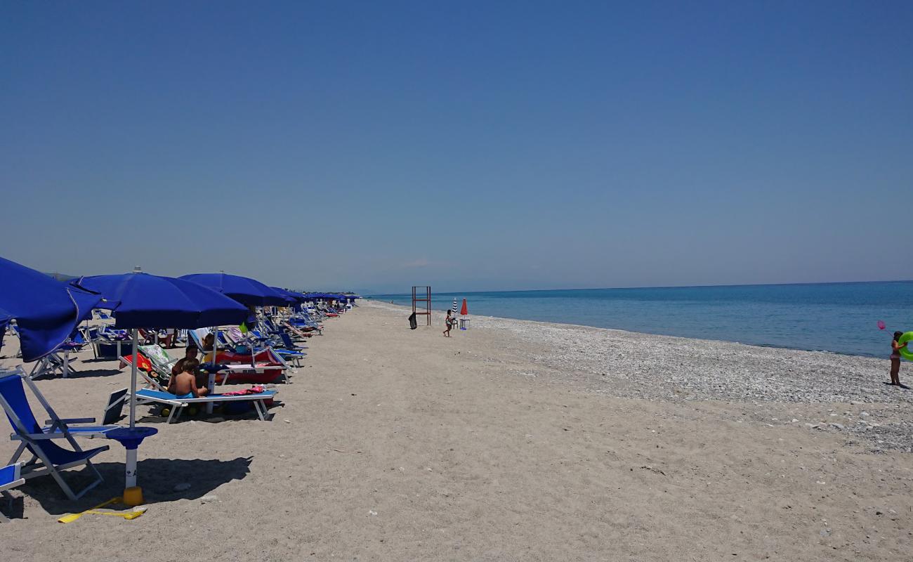 Guardavalle Beach'in fotoğrafı bej kum ve çakıl yüzey ile