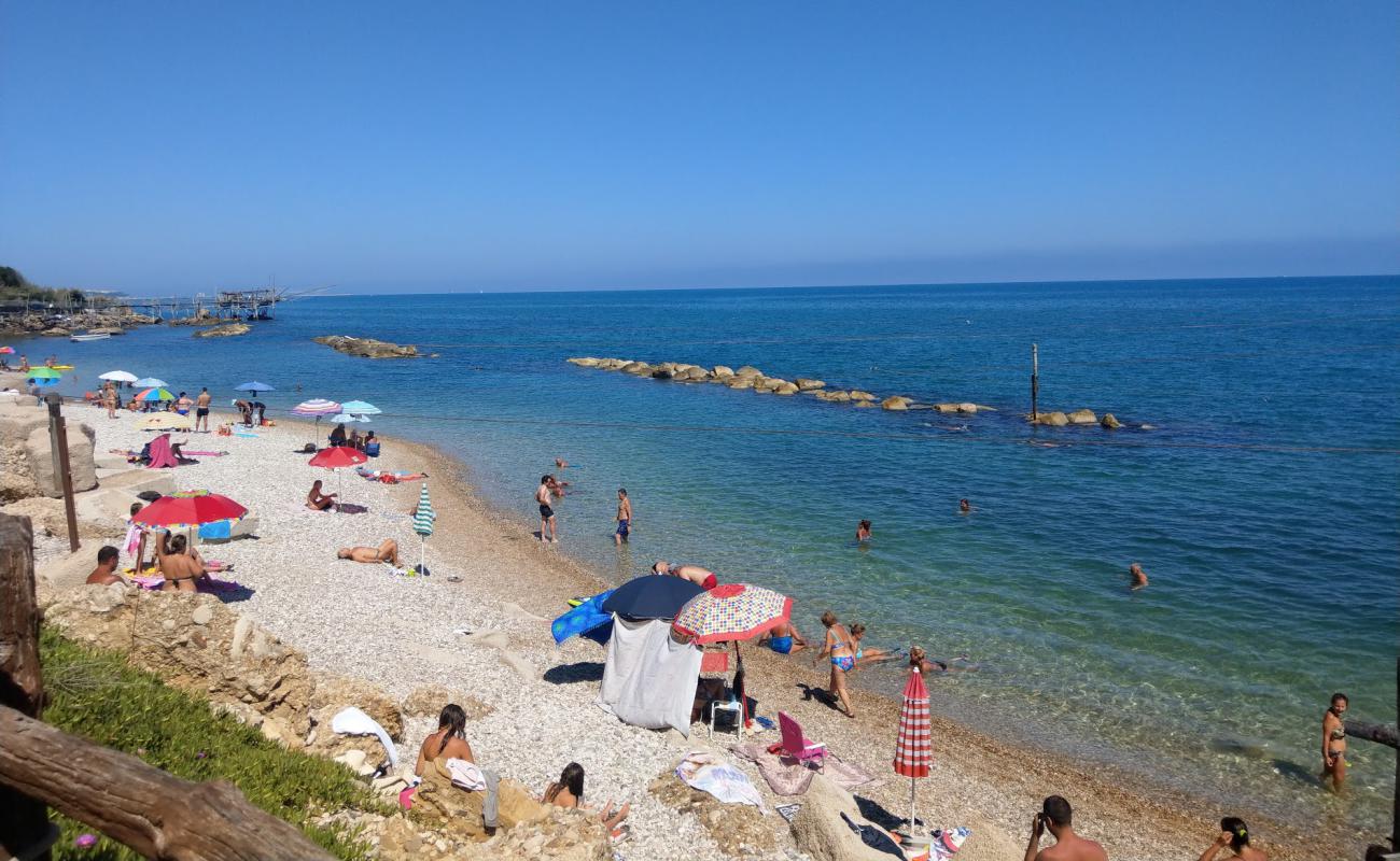 Valle Grotte Beach'in fotoğrafı gri çakıl taşı yüzey ile