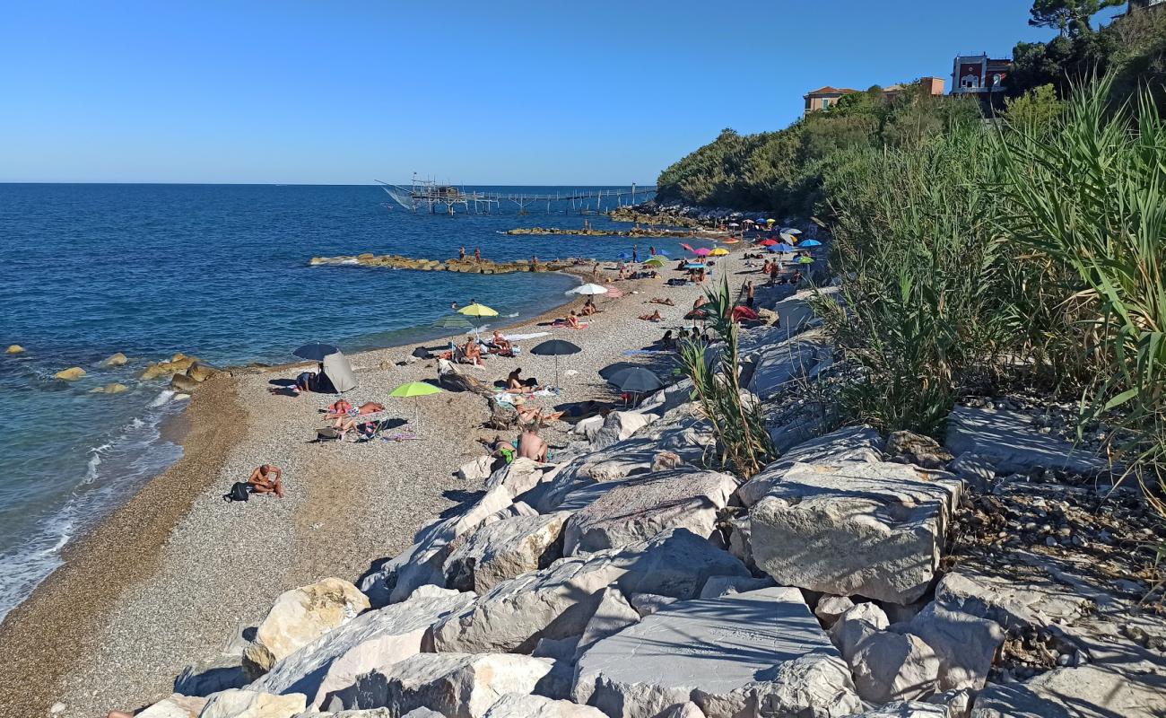 Spiaggia di Calata Turchino'in fotoğrafı hafif çakıl yüzey ile