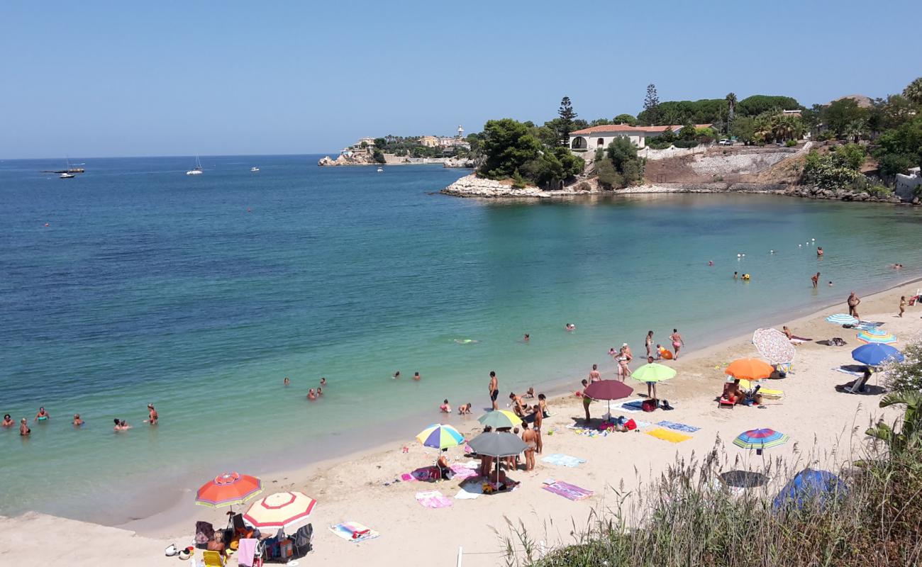 Spiaggia Punta del Pero'in fotoğrafı i̇nce kahverengi kum yüzey ile