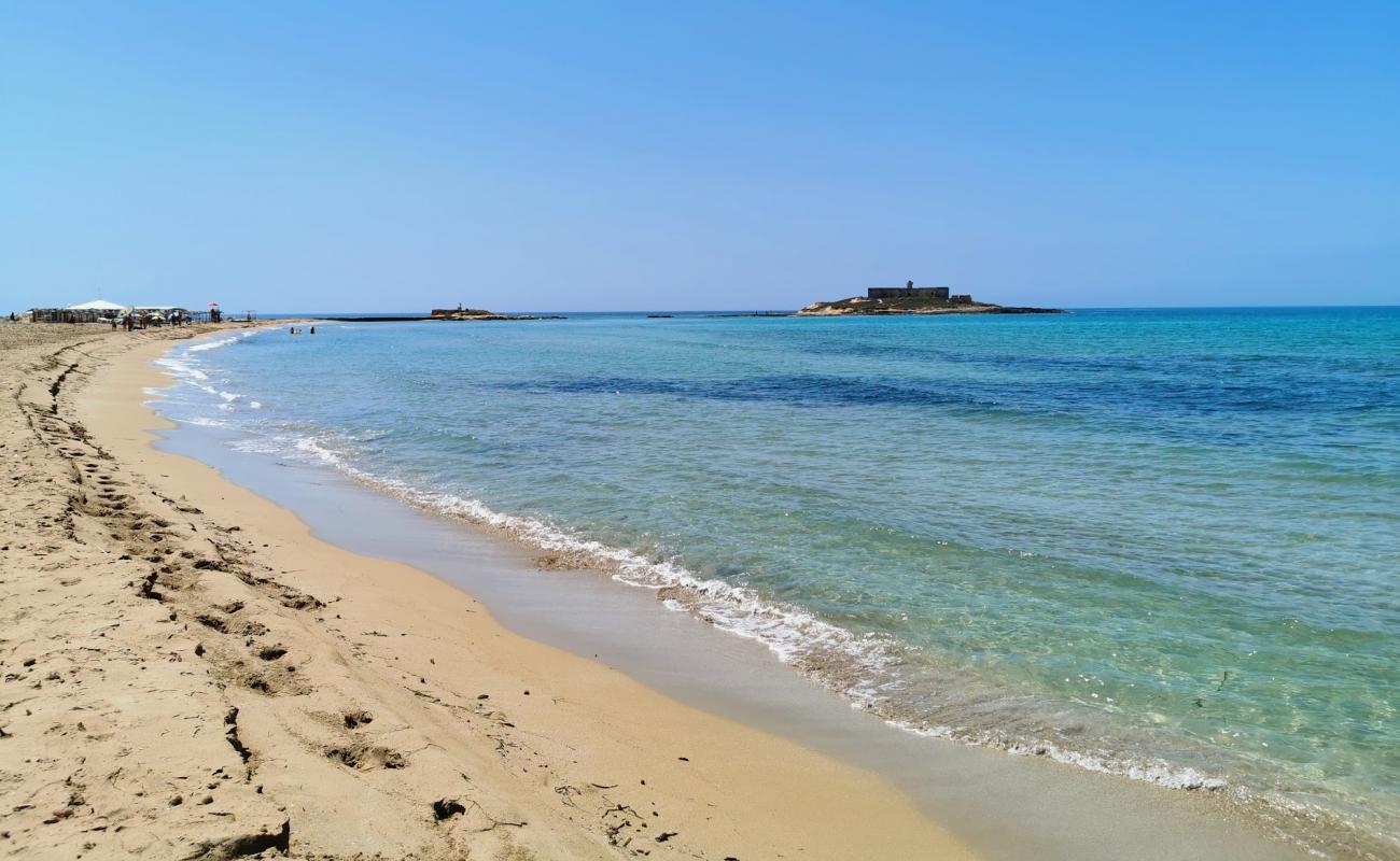 Isola delle Correnti'in fotoğrafı kahverengi kum yüzey ile