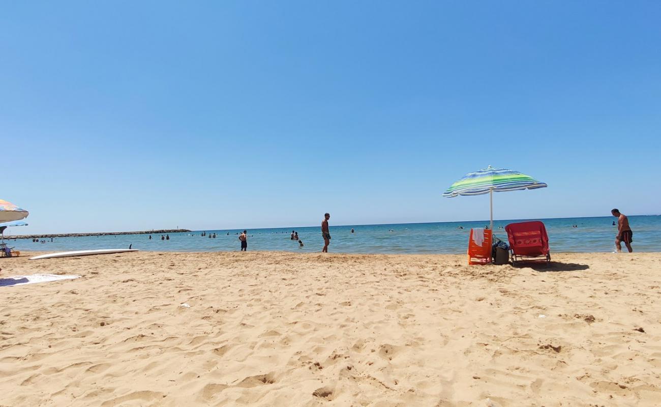 Spiaggia di Ponente'in fotoğrafı açık bej kum yüzey ile