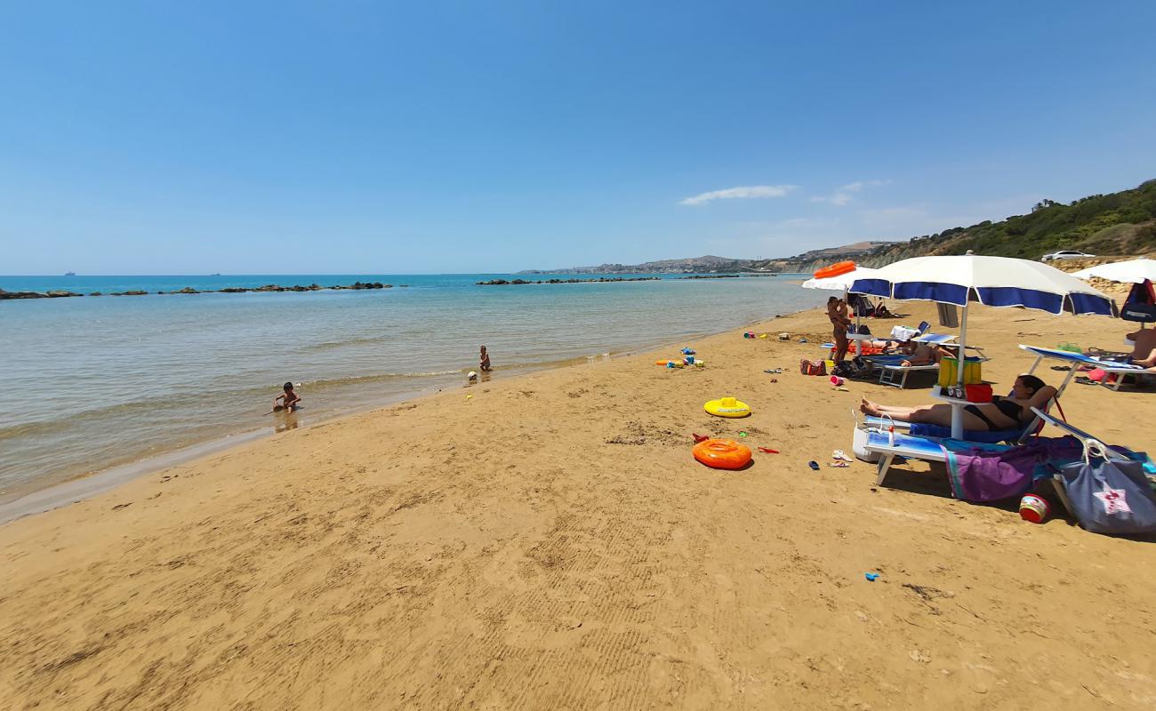Lido Maddalusa'in fotoğrafı açık bej kum yüzey ile