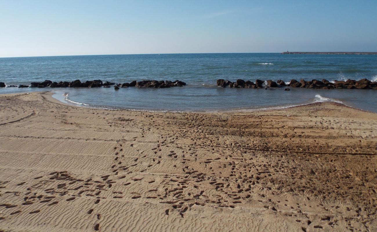 Baia Del Conte'in fotoğrafı açık bej kum yüzey ile