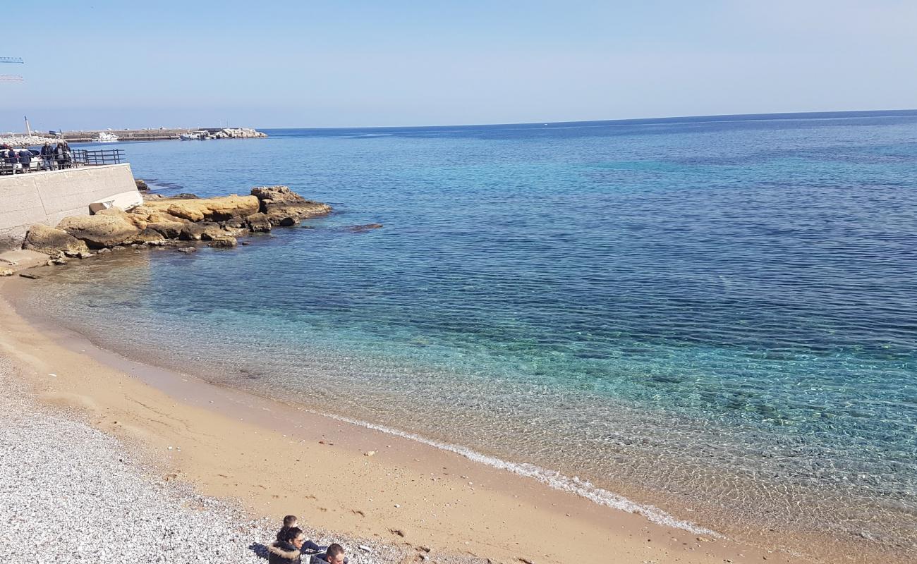 Spiaggia Olivella'in fotoğrafı bej kum ve çakıl yüzey ile