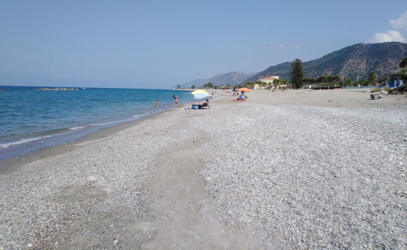 Spiaggia Ponte Naso'in fotoğrafı bej kum ve çakıl yüzey ile
