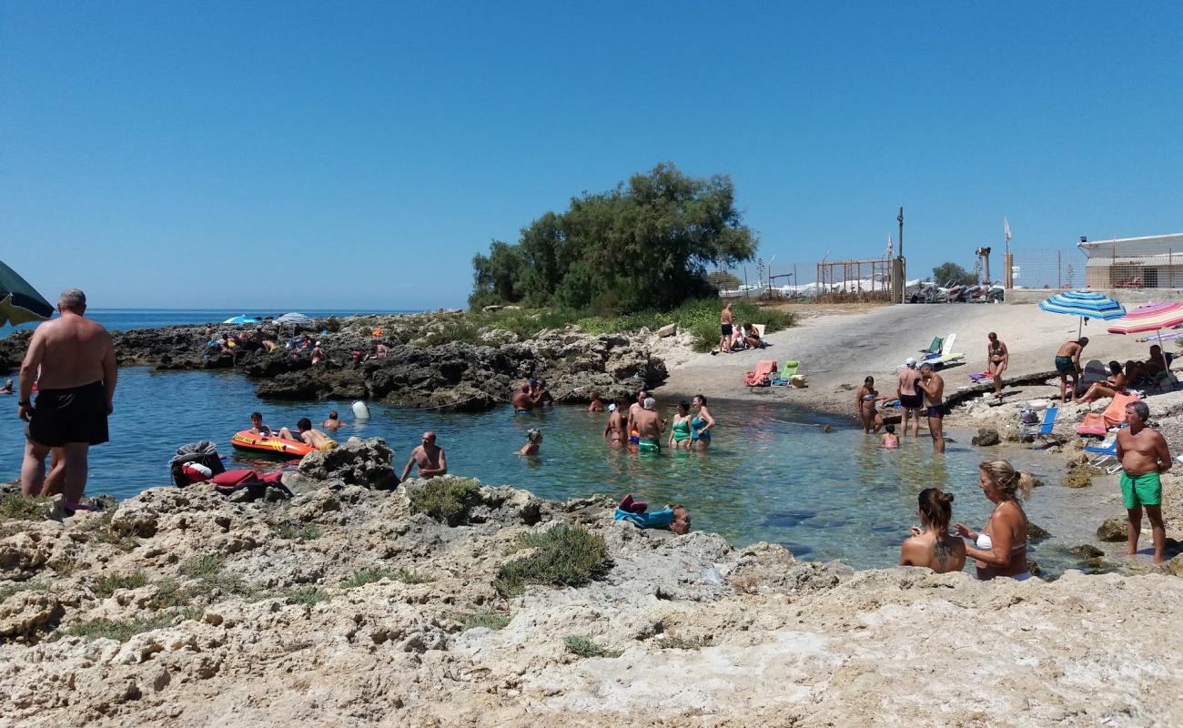 Spiaggia di Posto Vecchio'in fotoğrafı kayalık arazi yüzey ile