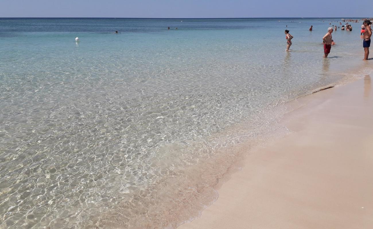 Spiaggia di Campo dei Messapi'in fotoğrafı açık bej kum yüzey ile