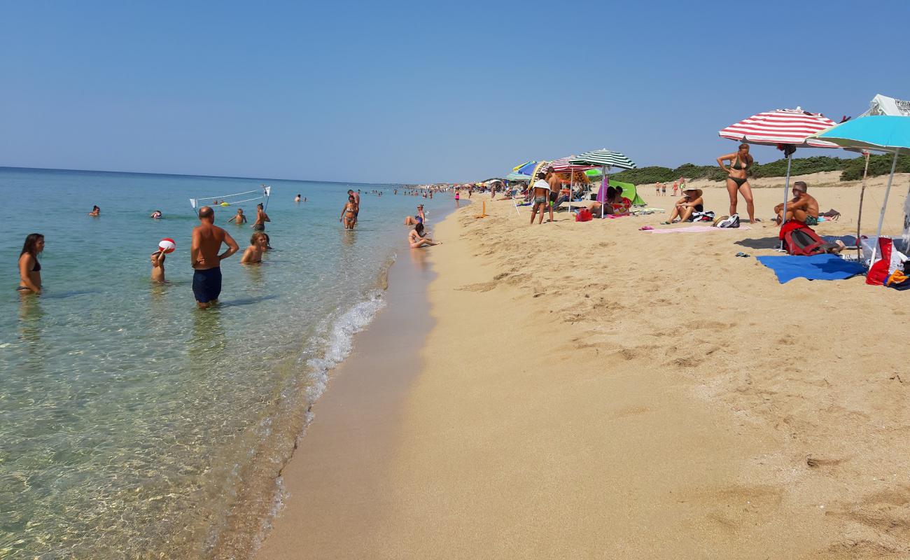 Torre Colimena beach'in fotoğrafı parlak ince kum yüzey ile