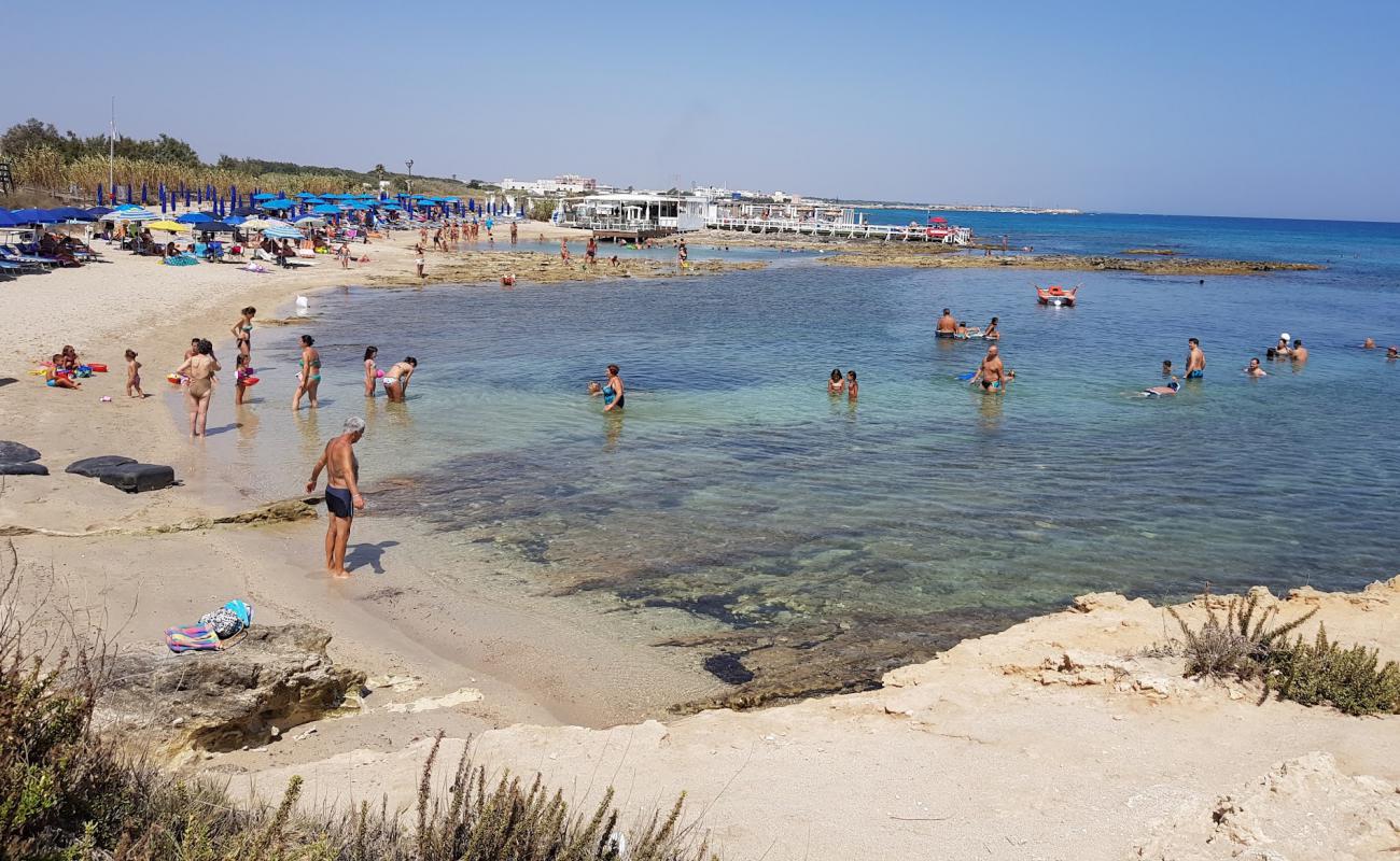 Kum beach'in fotoğrafı parlak kum yüzey ile