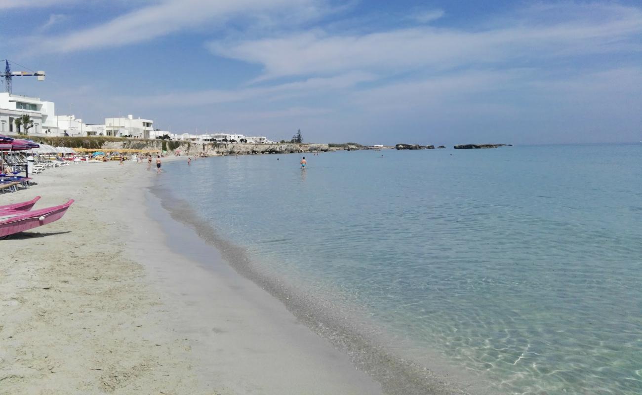 Spiaggia Le Fontanelle'in fotoğrafı açık bej kum yüzey ile