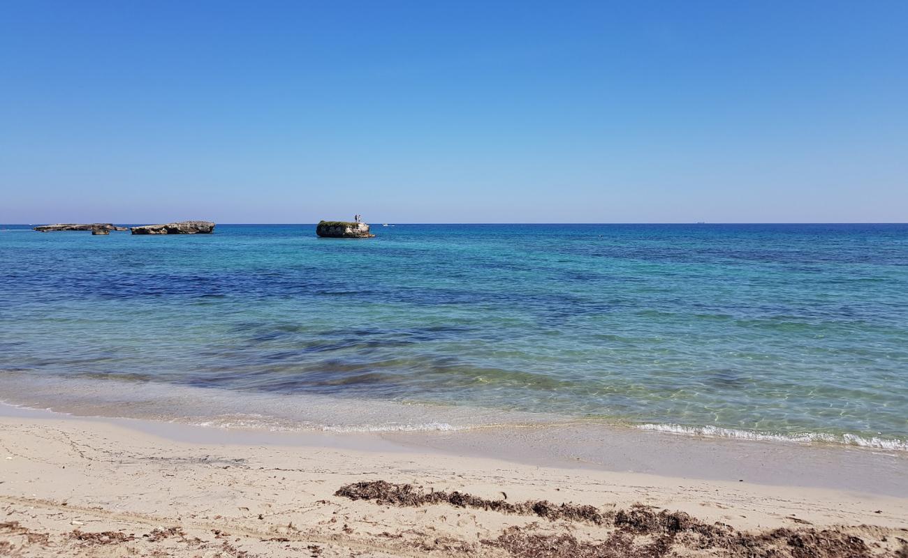 Spiaggia di Punta Cassano'in fotoğrafı açık bej kum yüzey ile