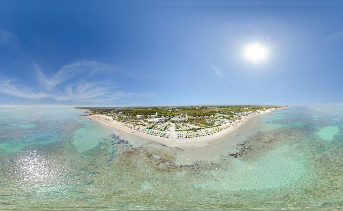 Spiaggia delle Idrovore'in fotoğrafı açık bej kum yüzey ile