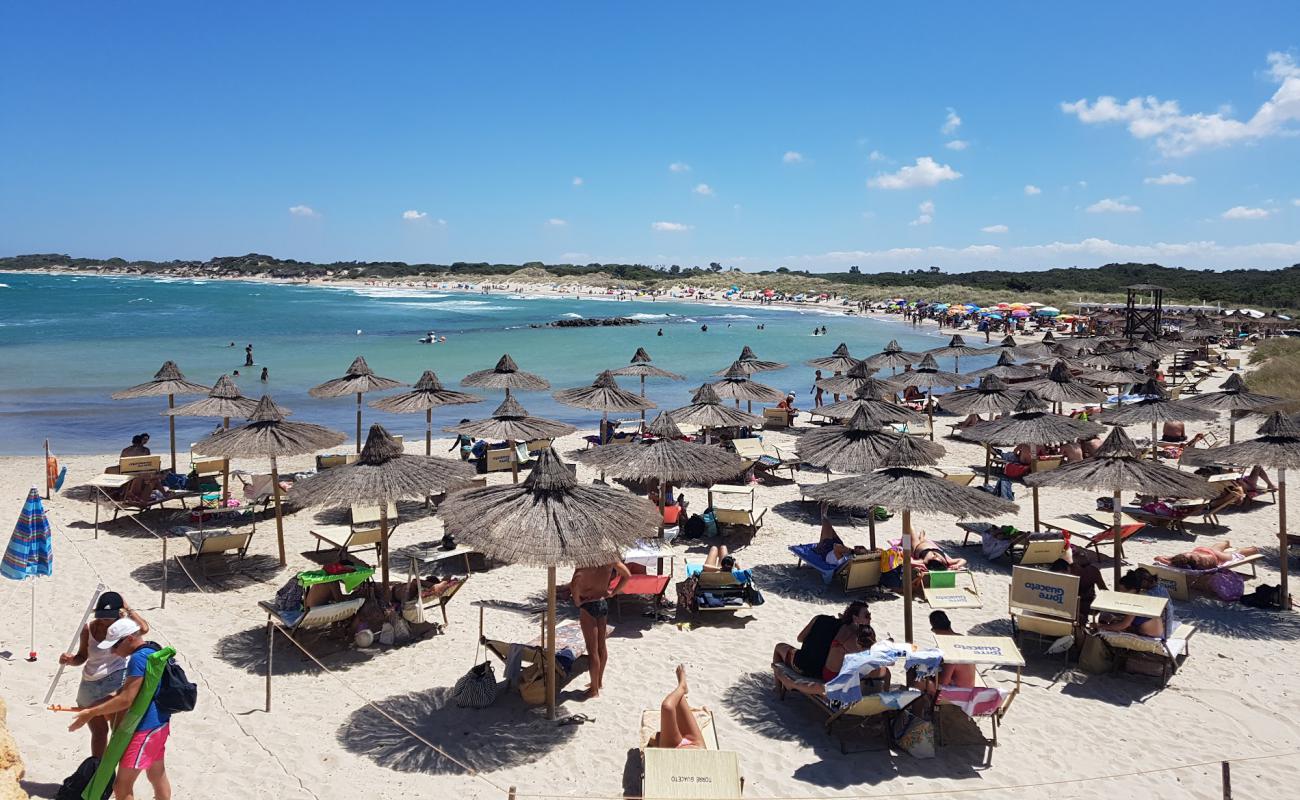 Punta Penna beach'in fotoğrafı parlak ince kum yüzey ile