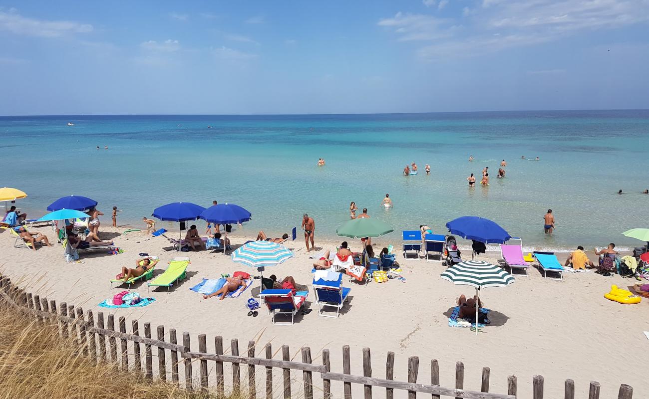 Spiaggia di Pilone'in fotoğrafı parlak kum yüzey ile