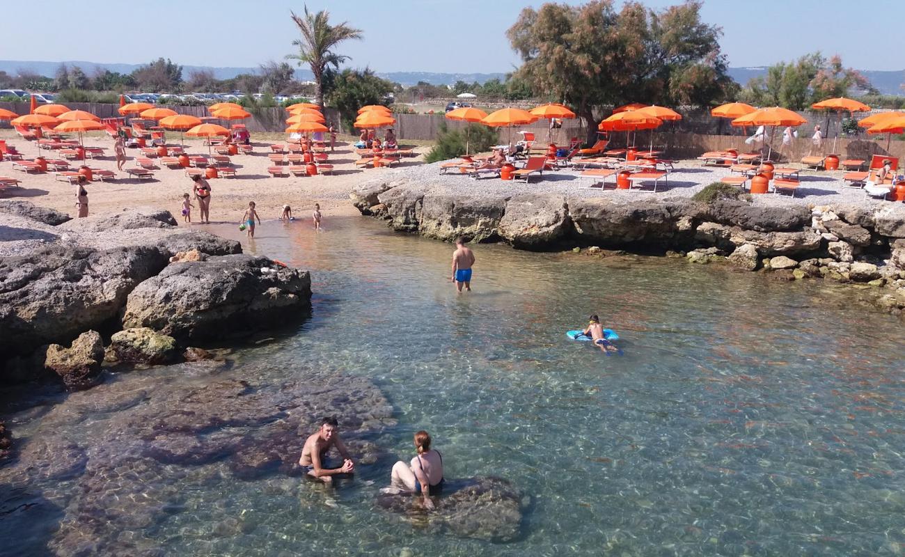 Lido Ottagono beach'in fotoğrafı açık bej kum yüzey ile