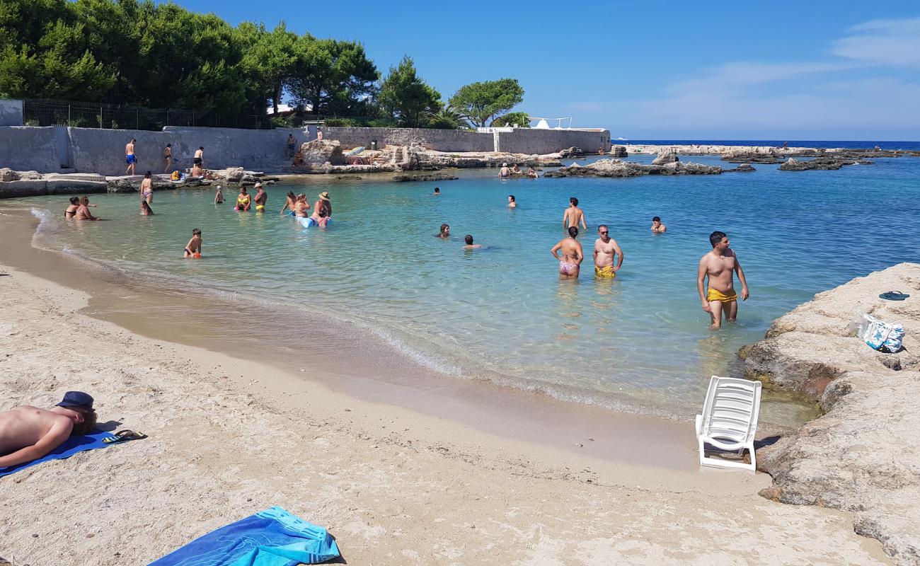 Porto Cavallo beach'in fotoğrafı parlak kum yüzey ile