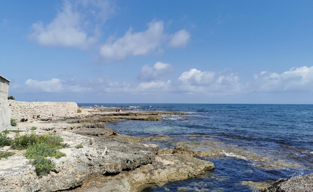 Libera blue wings beach'in fotoğrafı taşlı kum yüzey ile