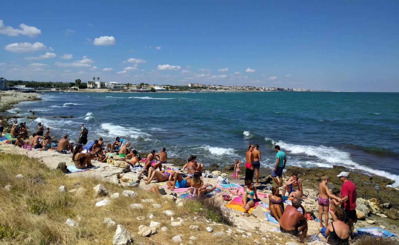 Terza Cala Beach'in fotoğrafı kayalık arazi yüzey ile