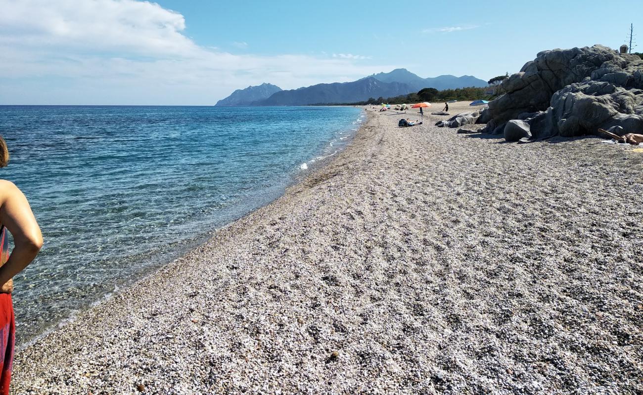 Spiaggia Sa Marina'in fotoğrafı bej kum ve çakıl yüzey ile