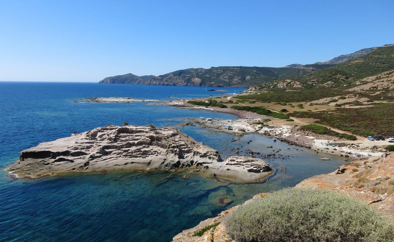 Torre Argentina beach'in fotoğrafı taşlar yüzey ile