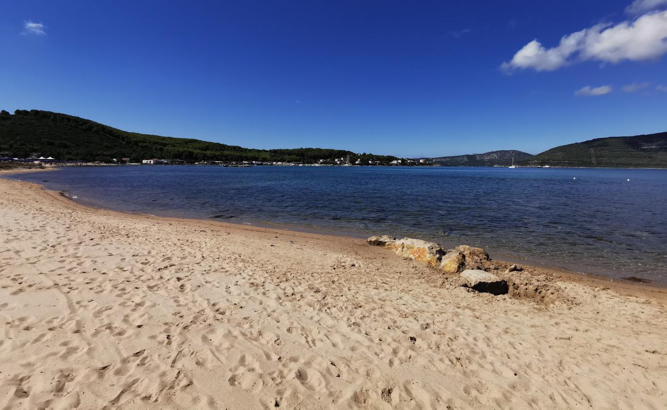 Porto Conte beach'in fotoğrafı parlak kum yüzey ile