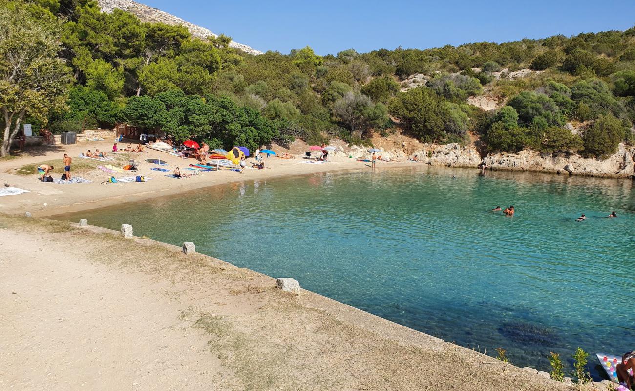 Cala Moresca Plajı'in fotoğrafı açık bej kum yüzey ile