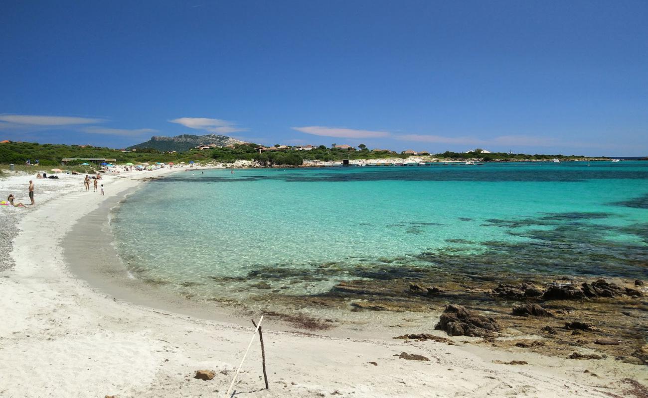 Spiaggia Cala Banana'in fotoğrafı açık bej kum yüzey ile