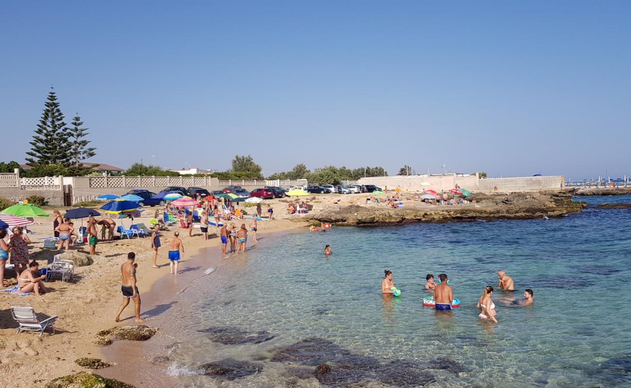Spiaggia Ex Motel Agip'in fotoğrafı bej kum ve kayalar yüzey ile