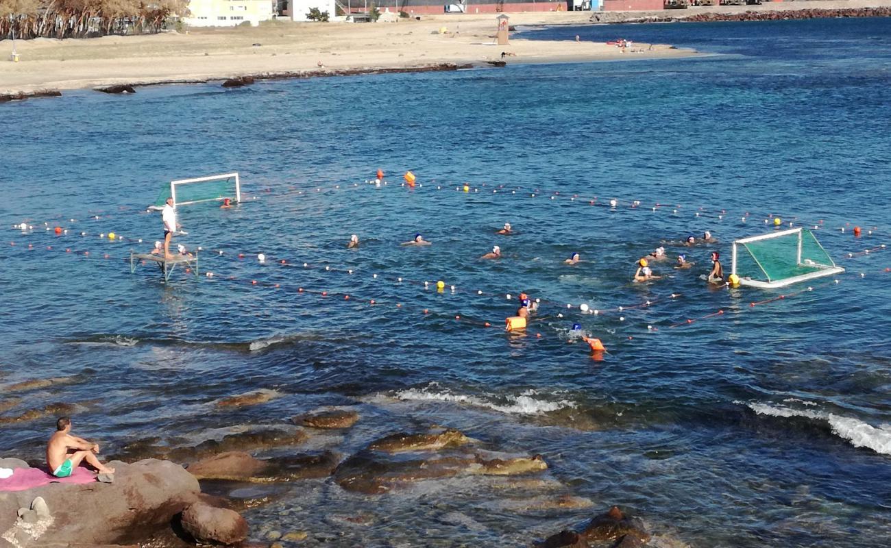 Portoscuso Beach'in fotoğrafı açık bej kum yüzey ile