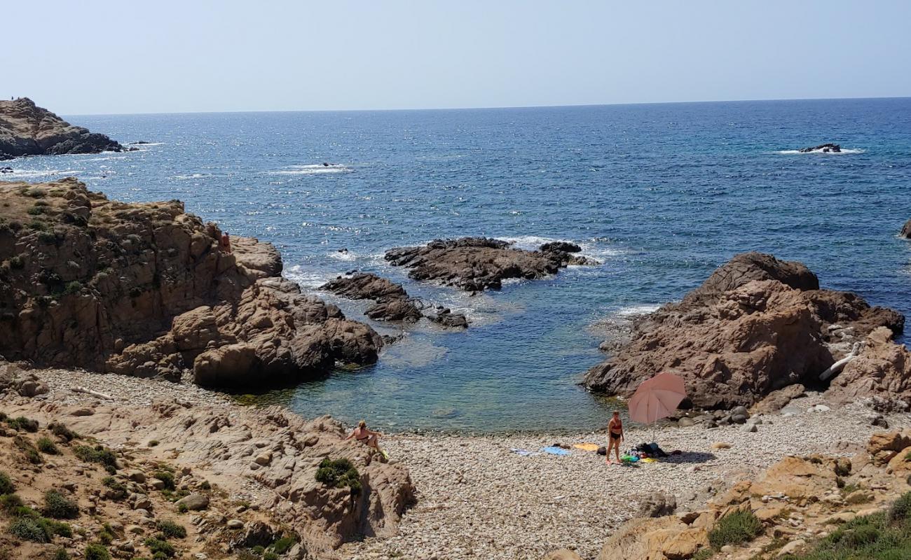 Capo Pecora Beach'in fotoğrafı kayalık arazi yüzey ile